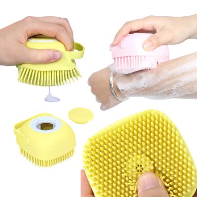 China Sustainable Pet Brush 2 in 1 Bath Massage Brush Shampoo Dispenser Dog Grooming Silicone Stiffens Shower Brush for sale