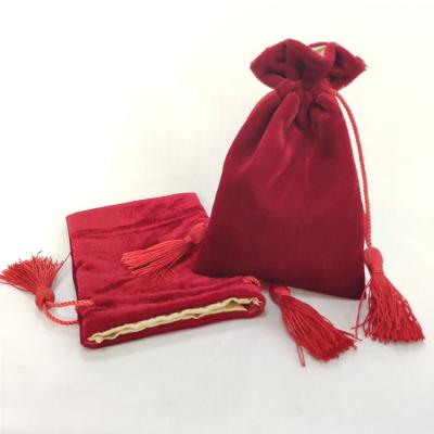 China Promotion custom velvet silk pouch, red pouch for bracelets, red velvet drawstring bag with tassel for sale