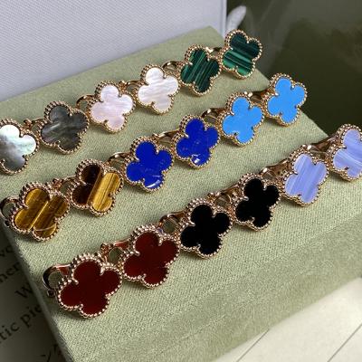 China New trend high quality lucky clover S925 earrings shape classic Van clover natural agate earclip pattern flower micro label earrings for sale