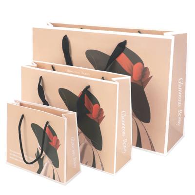 China Handmade wholesale luxury cheap handle black shopping paper bag with carton paper bag for packing stor for sale