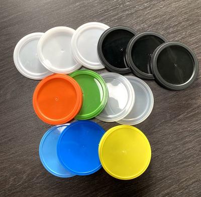 China Orange Plastic Lids For Tin Cans Blue Green Plastic Lids For Canned Dog Food à venda