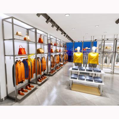 China Fashion Clothing Store Showroom Interior Decoration Wooden Layout Design Customized Clothing Store Furniture Clothing Display Rack for sale