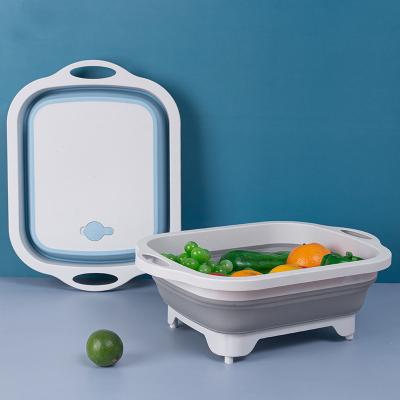 China Viable Filtered Portable Multifunctional Kitchen Drain Basket Vegetable and Fruit Cutting Board Foldable Cutting Board for sale