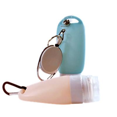 China Waist Leakproof Empty Bottles Personal Care Travel Squeeze Silicon Bottle Holder Key Chain Travel Bottles Containers With Hole Key Chain for sale