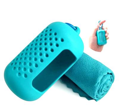 China Other Custom Sports Portable Foldable Microfiber Beach Quick Dry Towel With Silicone Case Sports Running Yoga Outdoor Travel Towel for sale