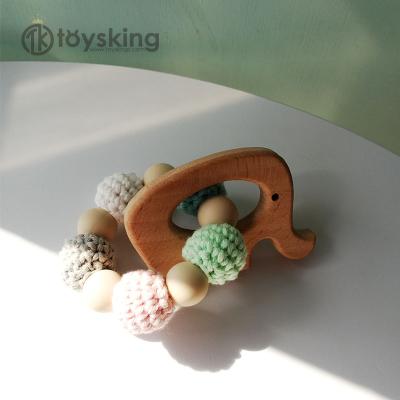 China Baby Gifts Silicone Baby Teether Bracelet Rattle Crochet Natural Wooden Animal Beads Teething Toys Baby Teether Silicone Sensory Beads for sale