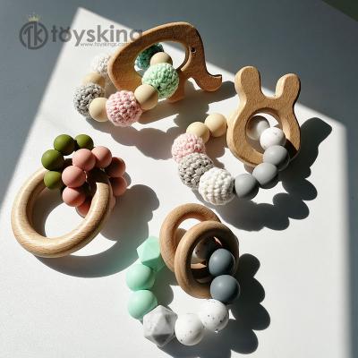 China Organic Wooden Baby Teething Ring With Silicone Beads Baby Gifts Teether Crochet Toy Wholesale for sale