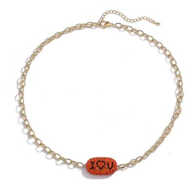 China BOHEMIA crystal pottery soft letters full of diamonds English alphabet necklace for men and women fruit strawberry bead necklace for sale