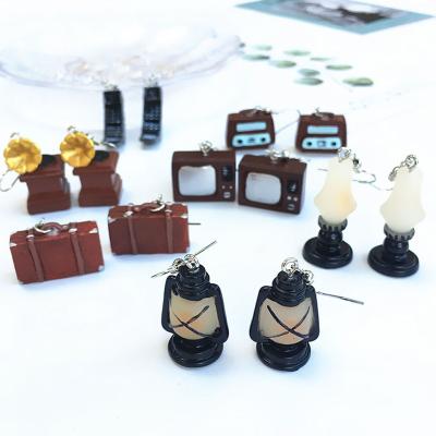 China Retro Horselight Kerosene Lamp Kerosene Lamp Handmade Nostalgic Personality Jewelry Vintage Funny Stud Earrings For Women for sale