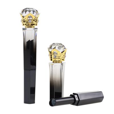 China Black Gold In The Stock Luxury Liquid Crown Skull Diamond Lipstick Gold Top Twist Up Tube Lipstick Tube Container for sale