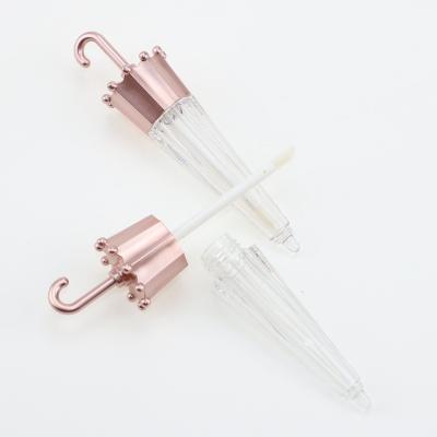 China Popular High End Umbrella Lip Gloss Tubes Luxury Gold Lip Gloss Containers Pink Tube for sale