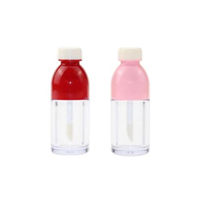 China Purple Red In Bottle Stock Shape Empty Colorful Drink Lipstick Container Packaging Soda Bottle Lip Gloss Tubes 5ml for sale