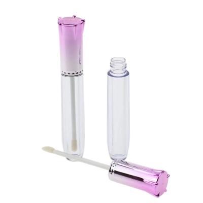 China 2022 Luxury Royal Top Empty Lip Gloss Containers Crown Cap Glittering Holographic Lip Gloss Tube for sale