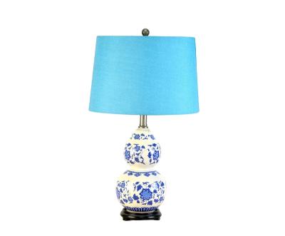 China Hot Modern Restaurant&Home Hotel Unique Modern Guest Room Iron Big Blue Ceramic Table Lamp for sale