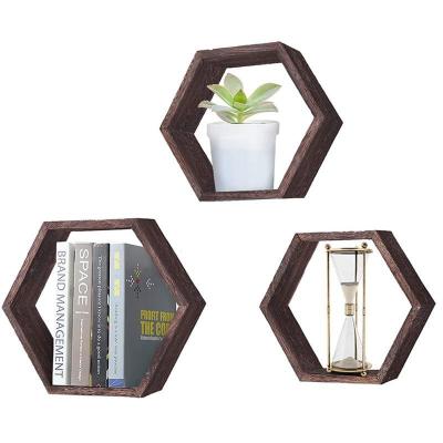 China Europe customized wholesale wooden wall shelf hexagonal honeycomb frame for home decoration for sale