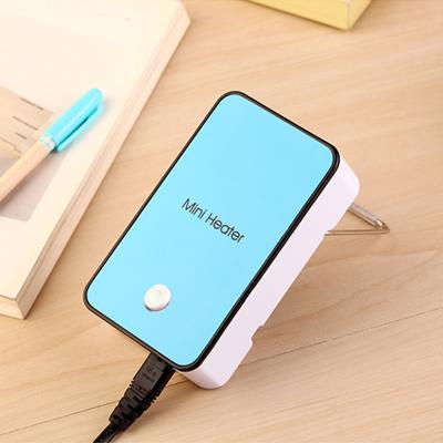 China Winter Portable Electric Practical Heaters Mini Plug Radiator Desktop Warmer Fan Energy Saving Machine for Office Hand Heater Fan for sale