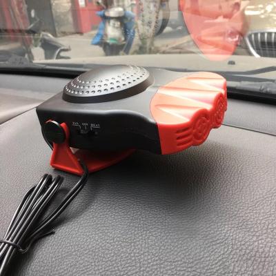 China Winter Portable Electric Handy Heaters Car Mini Plug Radiator Desktop Warmer Fan Energy Saving Machine for Office Hand Heater Fan for sale