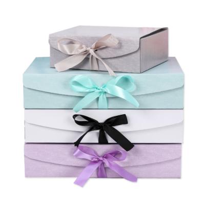 China Luxury Shoe Clothes Logo T-shirt Folding Recyclable Folding Gift Box With Ribbon for sale