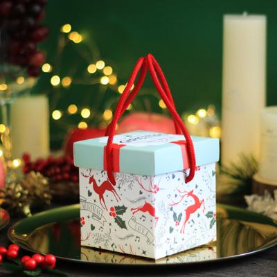 China Recyclable Christmas Decoration Gift Christmas Eve Packaging Gift Box With Ribbon for sale