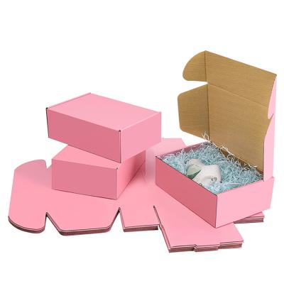 China Online Shopping Custom Corrugated Paper Box Recycled Materials Pink Color Mailing Box Size Design Stand Up Shipping Carton Outside Packing for sale