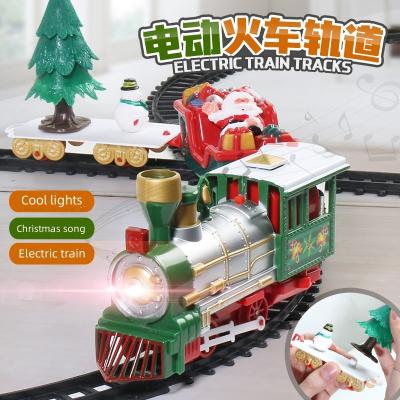 China Cool Light Educational Toys With Electric Train Track Deluxe Set Toys Rail Car Christmas Train Around The Tree for sale