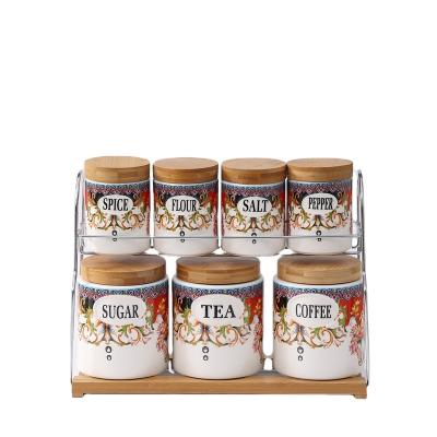 China 7 Pcs Sustainable Kitchen Canister Sets Ceramic Jars With Metal Rack For Storage Tea Coffee Sugar Porcelain Storage Canister With Lid for sale