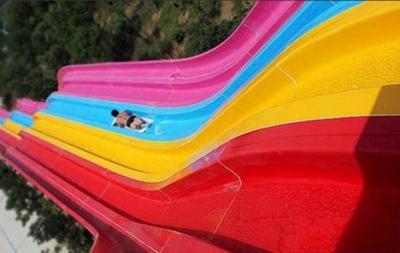 China 6 lanes Large Fiberglass Rainbow Water Slide 10m With High Slop Wave for sale