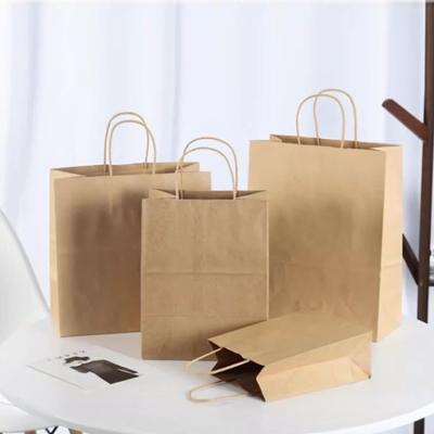 China Recycled Materials High Quality Wholesale Christmas Designs Paper Customised Designed Foldable Recicled Luxury Reusable Shopping Bags for sale