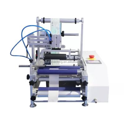 China Hot Food TS07 Turned Wine Bottle Plastic Bottle Labeling Machine Automatic Small Food Box Sticker Labeling Machine for sale