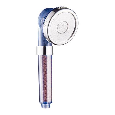 China Needle Free 3 Modes Water Saving Ion Filter Handheld Shower Head With Ion Mineral Balls for sale