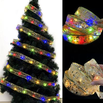 China Christmas Day Christmas Decorations LED Lights Twinkle Ribbon String Light Glowing Ribbon Pendant Xmas Tree Decoration for sale