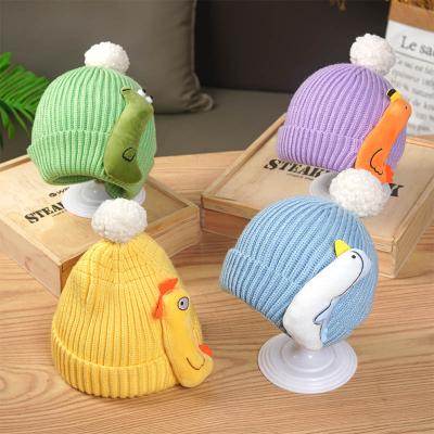 China Custom Picture Dome Knit Hat Pom Pom Kids Animal Pattern Keep Warm Solid Color Wool Knit Hat for sale