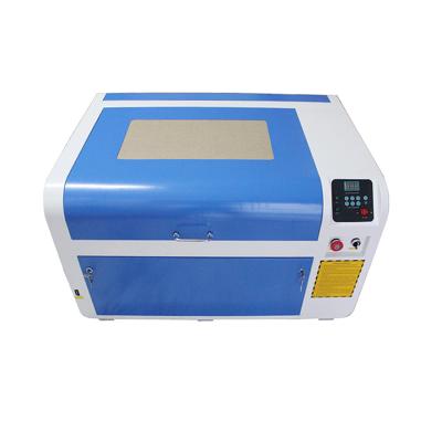 China Co2 Laser 50w Engraver Laser Engraving 4060 Table Top Head Module for sale