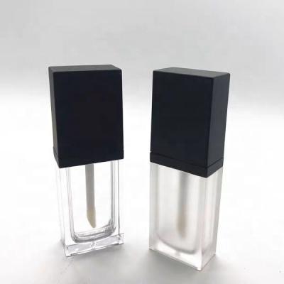 China 2022 New Square 8ml Luxury Cosmetic Matte Black Top Clear Tube Luxury Bottle Lip Gloss Packaging Lip Gel Gloss Containers With Magic Wands for sale