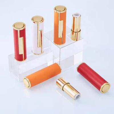 China 2022 New Low Moq Cosmetic Empty Press Sheepskin Lip Bam Glitter Lipstick Container Red White Orange Packaging Tube 12.1mm for sale