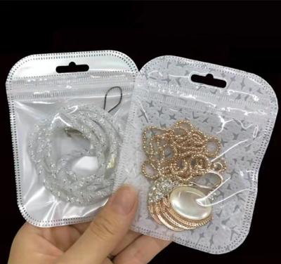 China Gift & New Style Craft Mini Jewelery Clear Plastic Clear Necklace Pouch Transparent Makeup Packaging Zipper Cosmetic Bags for sale