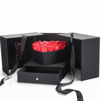 China Recyclable Luxury Custom Rigid Drawer Display Heart Boxes Romantic Roses Flowers Shape With Silk Handle for sale