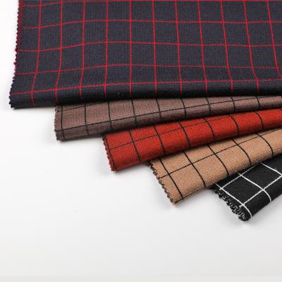 China Durable Wholesale Polyester Rayon Soft Feel Nylon Plaid Loaf Dyed Fabric For Winter Garment for sale