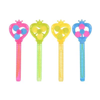 China Blowing Bubbles Fun Outdoor Bubble Wand Lovely Crown Windmill For Kids Bubble Stick Toy for sale