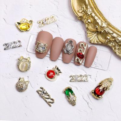 China Gem Nail Art Rhinestone Zircon Jewelry Charms Nail Gem 2022 Flat Back Metal Alloy Charms For Nails for sale