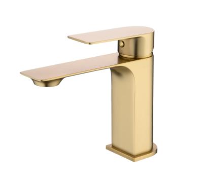 China Gold Finish Metered Faucets Gold Brushed Color Ormate Short Hot Cold Basin Wash Faucet for sale