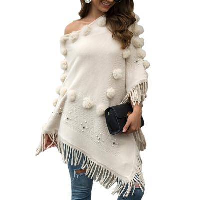 China Anti-wrinkle amazon apparel knitted shawl tassel coat ball around neck sweater women phocho sweaters for sale