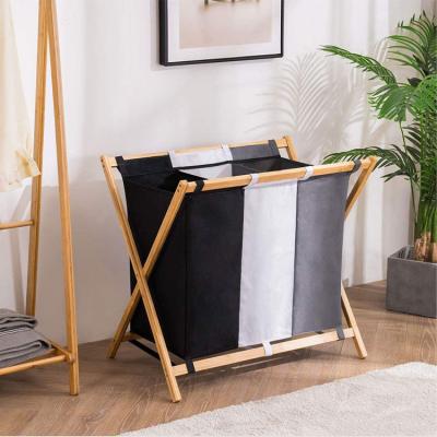 China No Foldable Bamboo Wood Wooden Laundry Basket Frame Bathroom Toilet Laundry Hamper Divider And Strings 3 Section Durable Bedroom Household for sale