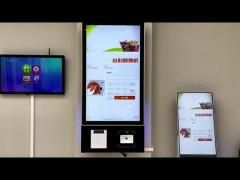 Wall mounted ticket printing kiosk