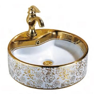 China Modern luxury shampoo sink counter top washbasin gold color around circular ceramic sink for sale