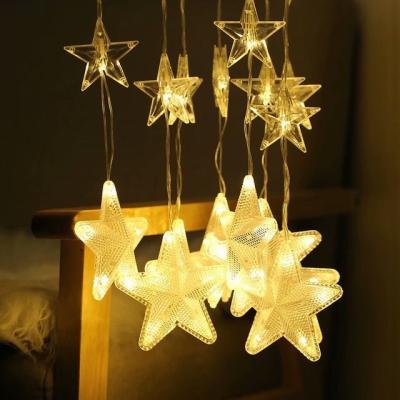 China Hot selling lighting string 2*1.2M color crutain star led strip light, plastic string icicle led curtain light for sale