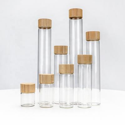 China Custom Glass Bottle 100ml Round Recyclable Material Glass Wine Bottle For Screw Cap for sale