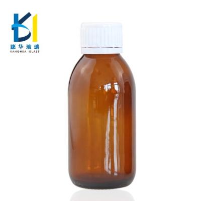 China Wholesale 50ml Syrup Glass Bottle Plastic Cylinder Medicine Amber Syrup Glass Bottle With Cap for sale