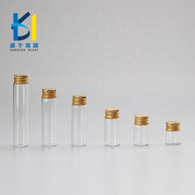 China Aluminum Screw Cap Mini Tubular Clear Glass Vials 10ml Gold Empty Top 5ml Personal Care for sale