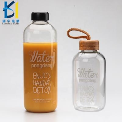 China Beverage 650ml 1000ml Custom Packaging Glass Juice Bottle 32 oz Beverage Glass Bottle for sale